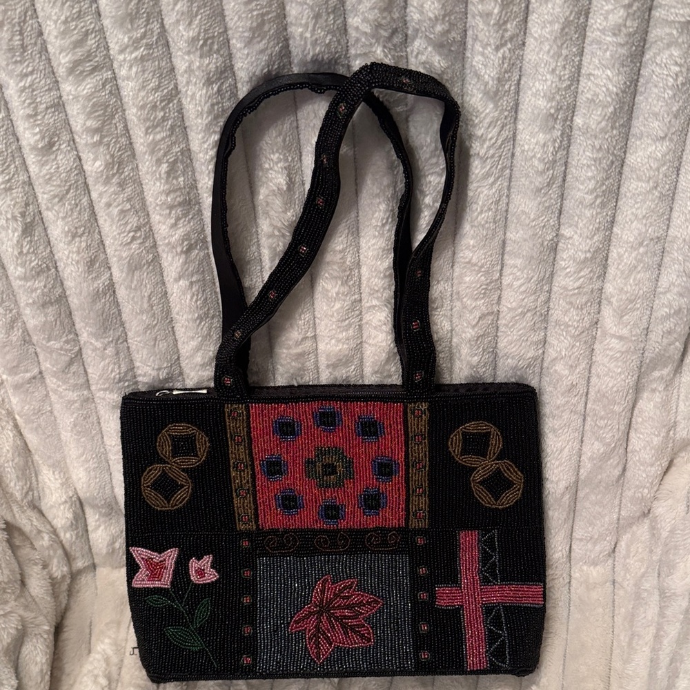 Elegant Black and Pink beaded hand bag.
